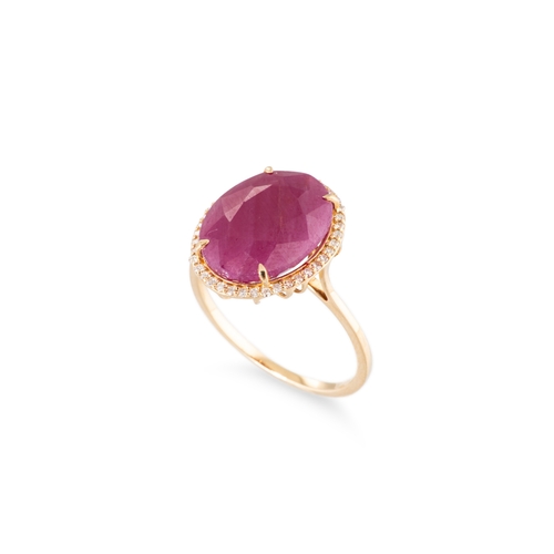 103 - A RUBY AND DIAMOND SET CLUSTER RING, the central oval ruby to diamond set surround, mounted in 14ct ... 