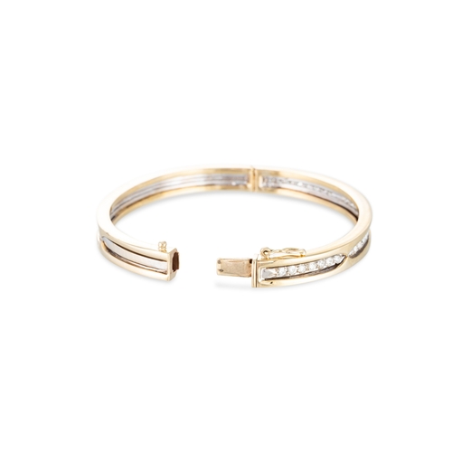 114 - A DIAMOND SET BANGLE, the round brilliant cut diamonds mounted in 14ct white and yellow gold. Estima... 