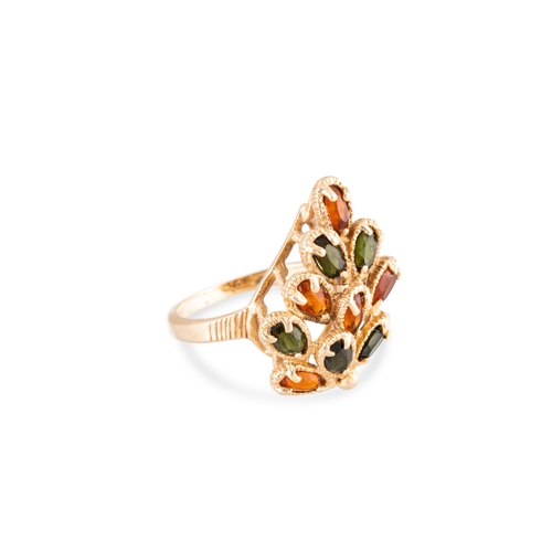 80 - A VINTAGE CLUSTER RING, of naturalistic form, set with orange and green stones, mounted in 14ct yell... 