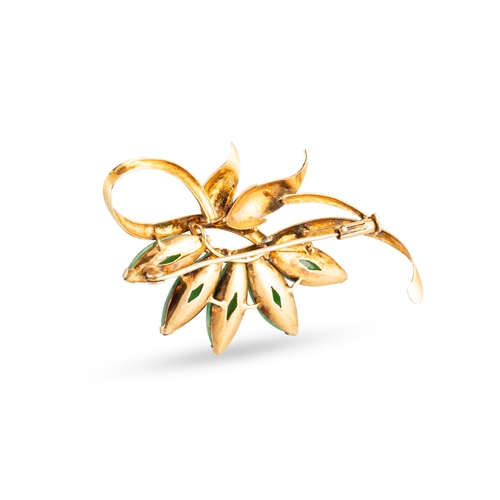 88 - A JADE SET BROOCH, of naturalistic form, mounted in 10ct gold, 6.5 g.