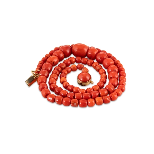 95 - A MEDITERRANEAN CORAL BEADED NECKLACE, the graduated red coral beads to a coral set 18ct gold clasp