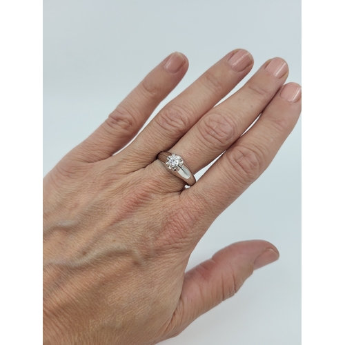 109 - A DIAMOND SOLITAIRE RING, the brilliant cut diamond mounted in 18ct white gold. Estimated: weight of... 