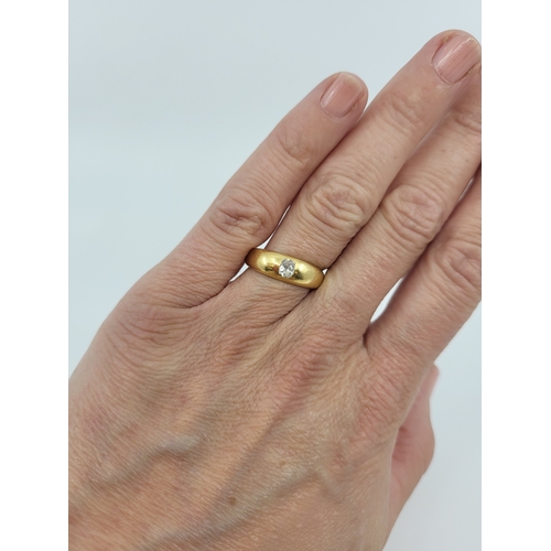79 - AN ANTIQUE DIAMOND SET RING, the 18ct gold band inset with an old cut diamond, size N