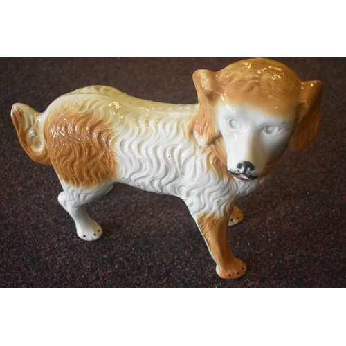 39 - ANTIQUE POTTERY LARGE DOG