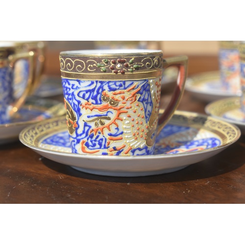 219 - HAND PAINTED ORIENTAL COFFEE SET