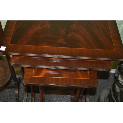 79 - NEST OF MAHOGANY TABLES