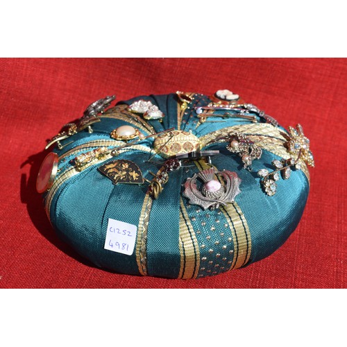 88 - VINTAGE PIN CUSHION WITH BROOCHES AND 3 ANTIQUE TIE PINS