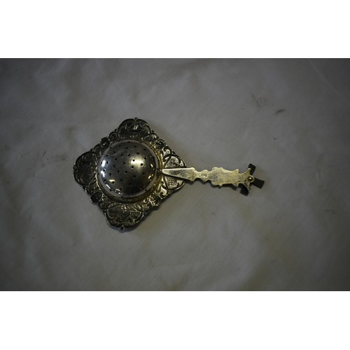 107 - SILVER TEA STRAINER