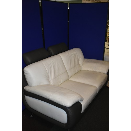 215 - CREAM AND BROWN LEATHER 2 SEATER SETTE WITH ADJUSTABLE HEAD RESTS