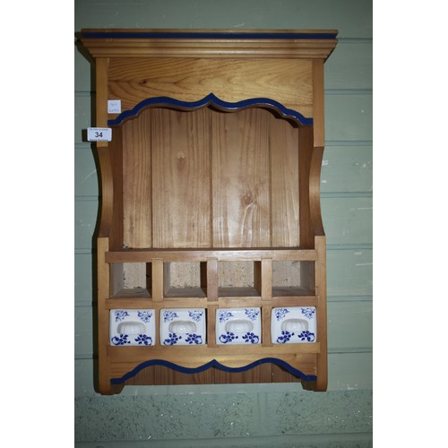 34 - SMALL PINE WALL RACK WITH PORCELAIN DRWAER FRONTS