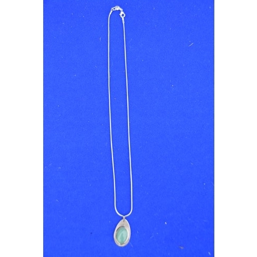 181 - SILVER JADE SET PENDANT ON SILVER CHAIN
