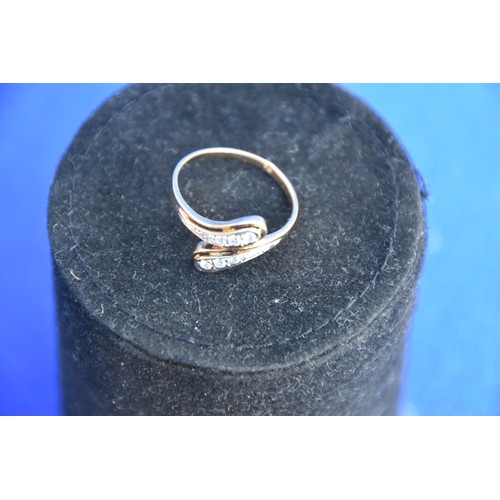 188 - 9CT GOLD AND CZ DRESS RING