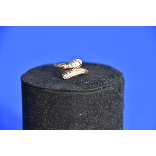 188 - 9CT GOLD AND CZ DRESS RING