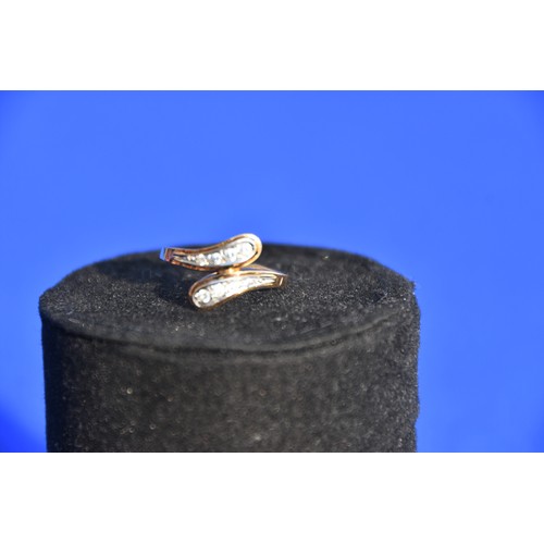 188 - 9CT GOLD AND CZ DRESS RING