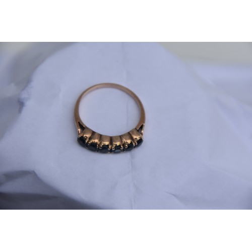 190 - 9CT GOLD AND SAPPHIRE RING