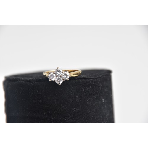 192 - 18CT GOLD 4 STONE 0.80CT DIAMOND RING