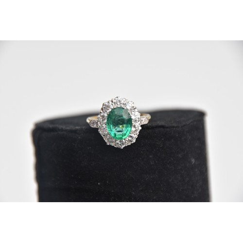 203 - 18CT GOLD EMERALD 2.2CT AND DIAMOND 1.35CT CLUSTER RING