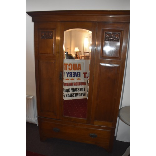 16 - EDWARDIAN CARVED PANEL DOUBLE ROBE WITH CENTER MIRRORED DOOR