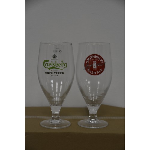 25 - 12 SMITHWICKS GLASSES & 8 CARSLBERG PINT GLASSES