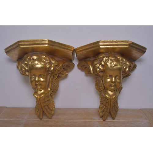 66 - PAIR OF GILT CHERUB BRACKETS (SLIGHT DAMAGE AS PHOTOGRAPHED)