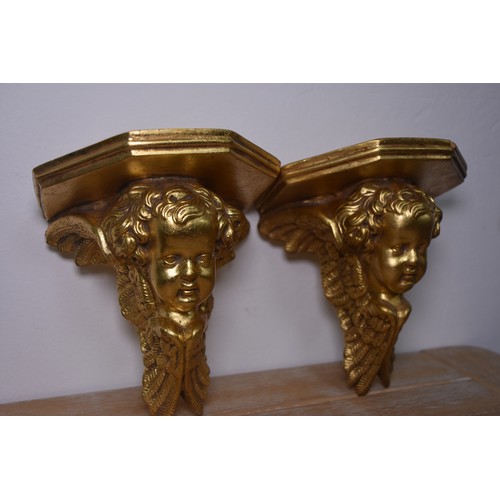 66 - PAIR OF GILT CHERUB BRACKETS (SLIGHT DAMAGE AS PHOTOGRAPHED)