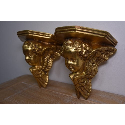 66 - PAIR OF GILT CHERUB BRACKETS (SLIGHT DAMAGE AS PHOTOGRAPHED)