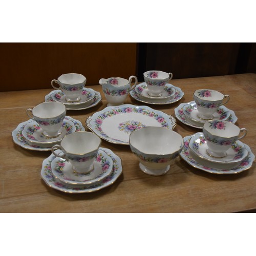 130 - 21 PIECE FINE BONE CHINA SERVICE TITLED 