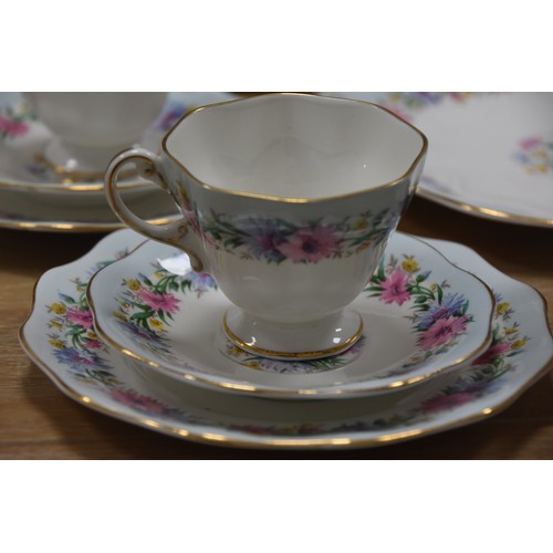 130 - 21 PIECE FINE BONE CHINA SERVICE TITLED 