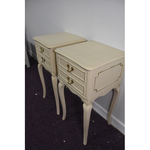 134 - PAIR OFCREAM FRENCH STYLE 2 DRAWER BEDSIDES IN GOOD CONDITION