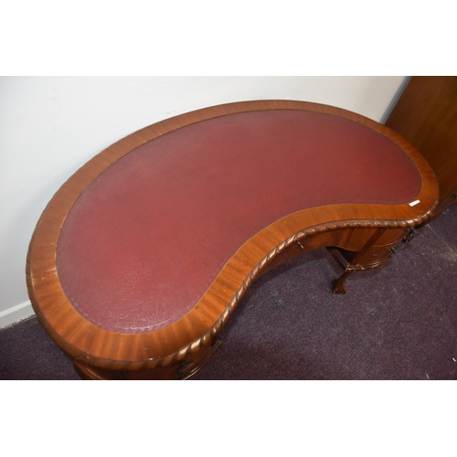 135 - RED LEATHER TOPPED KIDNEY DESK WITH CAB LEG ON BALL & CLAW FOOT IN VERY GOOD CONDITION