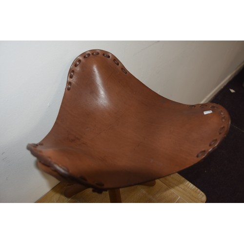 136 - LEATHER SADDLE SEATED TRIPOD FOLDING STOOL