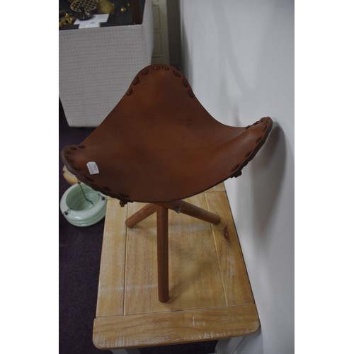 136 - LEATHER SADDLE SEATED TRIPOD FOLDING STOOL