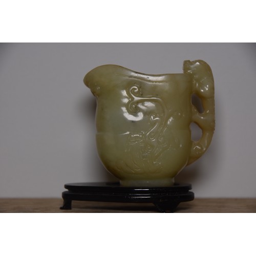 189 - SMALL ORNATE JADE JUG ON STAND