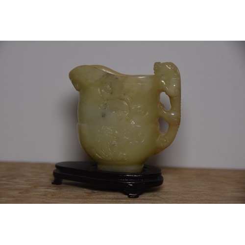 189 - SMALL ORNATE JADE JUG ON STAND