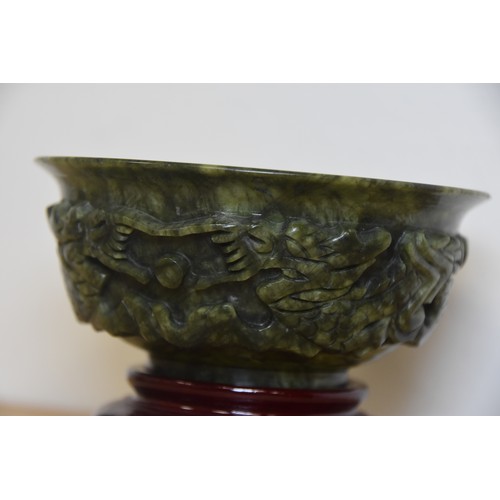 218 - JADE BOWL ON WOODEN STAND