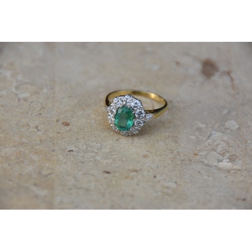 227A - 18CT GOLD EMERALD 1.15CT AND DIAMOND 0.50CT CLUSTER RING