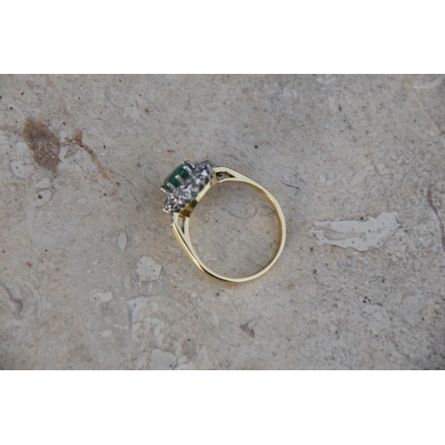 227A - 18CT GOLD EMERALD 1.15CT AND DIAMOND 0.50CT CLUSTER RING