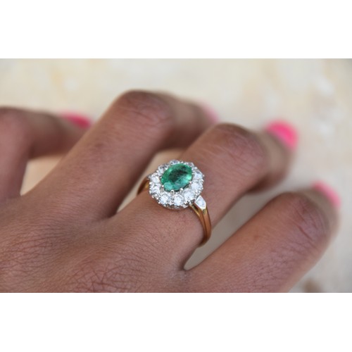 227A - 18CT GOLD EMERALD 1.15CT AND DIAMOND 0.50CT CLUSTER RING