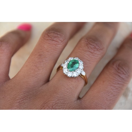 227A - 18CT GOLD EMERALD 1.15CT AND DIAMOND 0.50CT CLUSTER RING