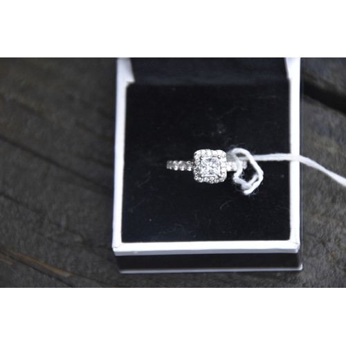 251 - 14CT WHITE GOLD SQUARE CUT DIAMOND RING 4 CLAW SETTING SURROUNDED BY PAVE SET MOUNT ALL WITH DIAMOND... 