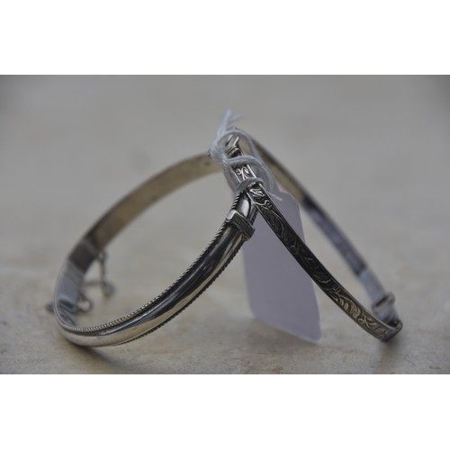 257 - SILVER CLADDAGH BANGLE AND SILVER HINGED BANGLE