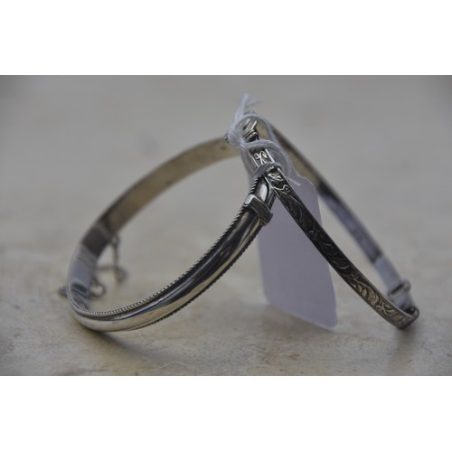 257 - SILVER CLADDAGH BANGLE AND SILVER HINGED BANGLE