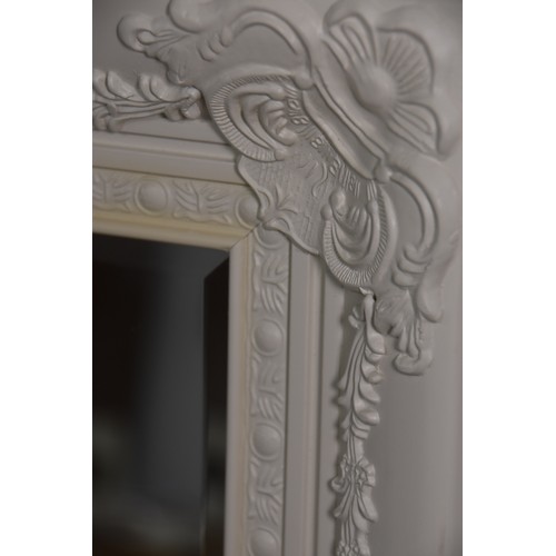 262 - BEVELLED EDGED MIRROR WITH ORNATE WHITE FRAME OVERALL MEASURING 45