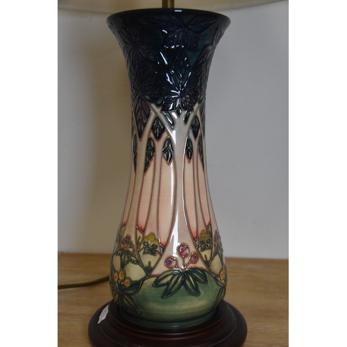 304 - BELIEVED TO BE MOORCROFT LAMP COMPLETE WITH SHADE