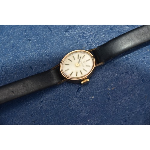 255 - 9CT TISSOT LADIES WATCH