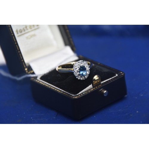 230 - 18CT BLUE TOPAZ & DIAMOND RING SIZE M (CAN BE RESIZED)