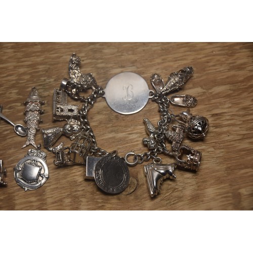 231A - HEAVY SILVER BRACELET WITH EXTRA CHARMS