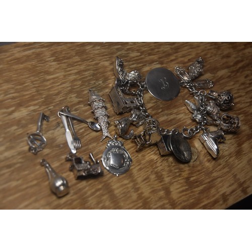 231A - HEAVY SILVER BRACELET WITH EXTRA CHARMS