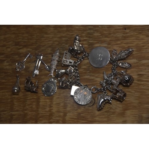 231A - HEAVY SILVER BRACELET WITH EXTRA CHARMS