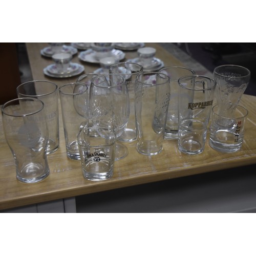 28 - LARGE QTY OF MIXED GLASSWARE INCLUDING GUINNESS, COKE ETC